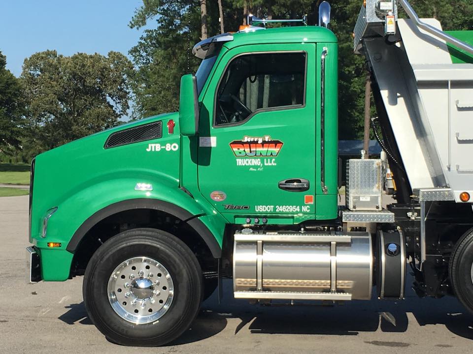 Jerry T. Bunn Trucking green dump truck ready for a community parade near Wilson, NC