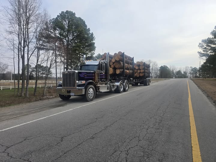 Logging truck hauling materials in Eastern North Carolina